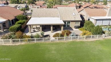 Nestled in a vibrant gated active adult community, this stunning on Palo Verde Golf and Country Club in Arizona - for sale on GolfHomes.com, golf home, golf lot