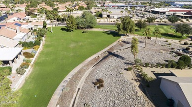 Nestled in a vibrant gated active adult community, this stunning on Palo Verde Golf and Country Club in Arizona - for sale on GolfHomes.com, golf home, golf lot