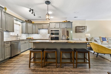 Step into easy, first floor living with fairway views that feel on Myrtlewood Golf Course and Club  in South Carolina - for sale on GolfHomes.com, golf home, golf lot