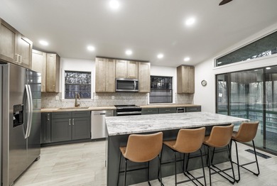 THIS IS A MUST SEE!! STUNNING TOTAL RENOVATION ON PRIVATE on DeSoto Golf Course in Arkansas - for sale on GolfHomes.com, golf home, golf lot