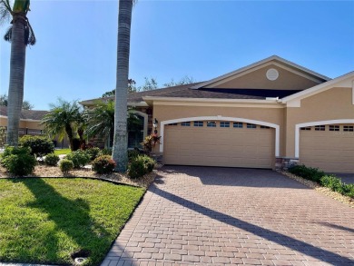 Stunning end unit, 3/2/2, 2013 built, split floor plan, 1471sf on Bobcat Trail Golf Club in Florida - for sale on GolfHomes.com, golf home, golf lot