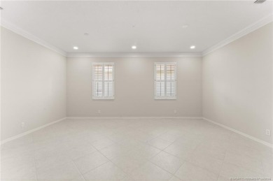 Discover the perfect blend of comfort, style, and location at on Eagle Marsh Golf Club in Florida - for sale on GolfHomes.com, golf home, golf lot