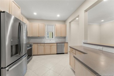 Discover the perfect blend of comfort, style, and location at on Eagle Marsh Golf Club in Florida - for sale on GolfHomes.com, golf home, golf lot