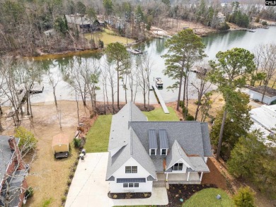 Discover the perfect blend of timeless craftsmanship and modern on Timberlake Country Club in South Carolina - for sale on GolfHomes.com, golf home, golf lot