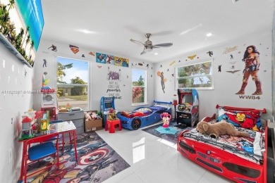 Beautifully renovated 5.5-bedroom, 3.5-bathroom pool home on a on The Club at Emerald Hills in Florida - for sale on GolfHomes.com, golf home, golf lot