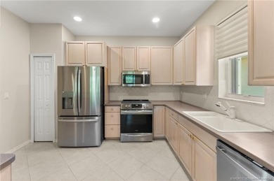 Discover the perfect blend of comfort, style, and location at on Eagle Marsh Golf Club in Florida - for sale on GolfHomes.com, golf home, golf lot