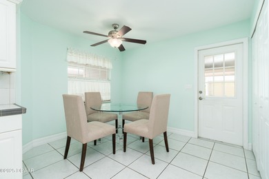 Experience the essence of refined Florida living in this on Spruce Creek Golf Club in Florida - for sale on GolfHomes.com, golf home, golf lot