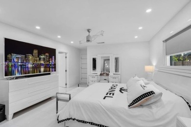 Beautifully renovated 5.5-bedroom, 3.5-bathroom pool home on a on The Club at Emerald Hills in Florida - for sale on GolfHomes.com, golf home, golf lot