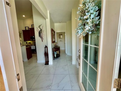Stunning end unit, 3/2/2, 2013 built, split floor plan, 1471sf on Bobcat Trail Golf Club in Florida - for sale on GolfHomes.com, golf home, golf lot