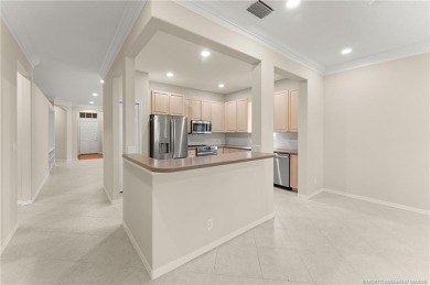 Discover the perfect blend of comfort, style, and location at on Eagle Marsh Golf Club in Florida - for sale on GolfHomes.com, golf home, golf lot