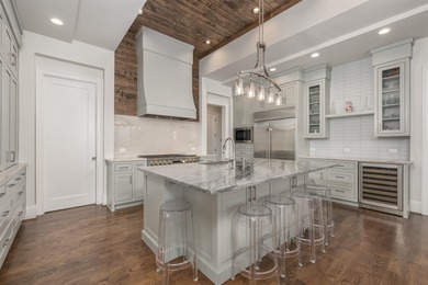 Discover luxurious lakefront living at its finest with this on Reynolds Lake Oconee - The Oconee in Georgia - for sale on GolfHomes.com, golf home, golf lot