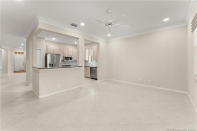 Discover the perfect blend of comfort, style, and location at on Eagle Marsh Golf Club in Florida - for sale on GolfHomes.com, golf home, golf lot