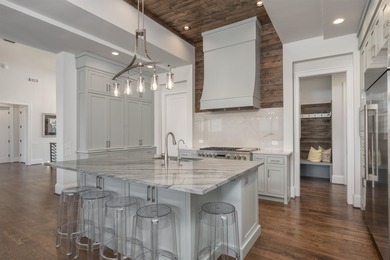 Discover luxurious lakefront living at its finest with this on Reynolds Lake Oconee - The Oconee in Georgia - for sale on GolfHomes.com, golf home, golf lot