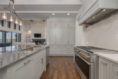 Discover luxurious lakefront living at its finest with this on Reynolds Lake Oconee - The Oconee in Georgia - for sale on GolfHomes.com, golf home, golf lot