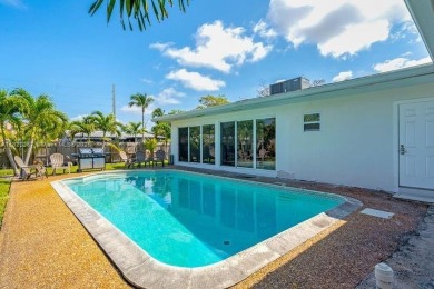 Beautifully renovated 5.5-bedroom, 3.5-bathroom pool home on a on The Club at Emerald Hills in Florida - for sale on GolfHomes.com, golf home, golf lot