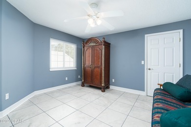 Experience the essence of refined Florida living in this on Spruce Creek Golf Club in Florida - for sale on GolfHomes.com, golf home, golf lot