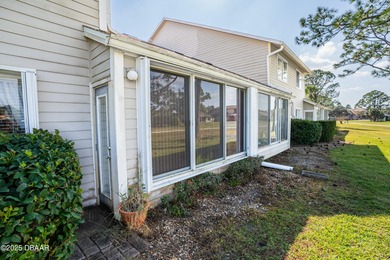 Experience the essence of refined Florida living in this on Spruce Creek Golf Club in Florida - for sale on GolfHomes.com, golf home, golf lot