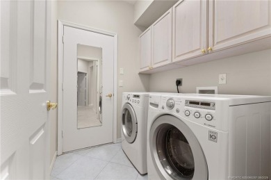 Discover the perfect blend of comfort, style, and location at on Eagle Marsh Golf Club in Florida - for sale on GolfHomes.com, golf home, golf lot