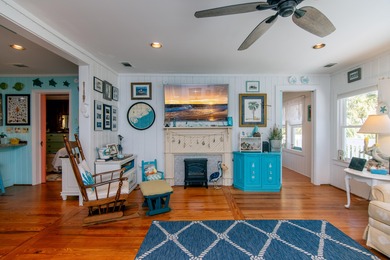 Charming and beautifully updated coastal cottage blending on The Plantation Course At Edisto in South Carolina - for sale on GolfHomes.com, golf home, golf lot