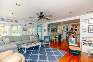 Charming and beautifully updated coastal cottage blending on The Plantation Course At Edisto in South Carolina - for sale on GolfHomes.com, golf home, golf lot