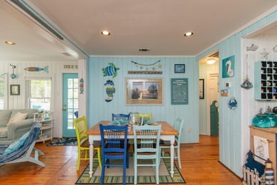 Charming and beautifully updated coastal cottage blending on The Plantation Course At Edisto in South Carolina - for sale on GolfHomes.com, golf home, golf lot