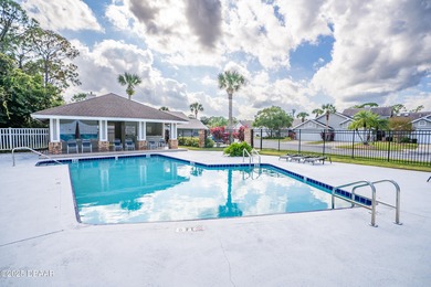 Experience the essence of refined Florida living in this on Spruce Creek Golf Club in Florida - for sale on GolfHomes.com, golf home, golf lot