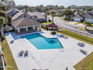 Experience the essence of refined Florida living in this on Spruce Creek Golf Club in Florida - for sale on GolfHomes.com, golf home, golf lot