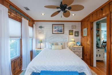 Charming and beautifully updated coastal cottage blending on The Plantation Course At Edisto in South Carolina - for sale on GolfHomes.com, golf home, golf lot