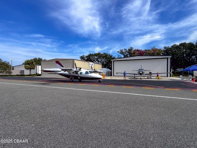 Experience the essence of refined Florida living in this on Spruce Creek Golf Club in Florida - for sale on GolfHomes.com, golf home, golf lot