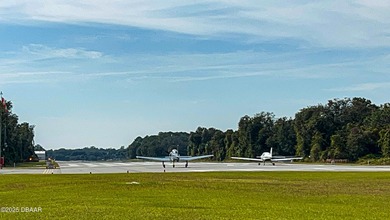 Experience the essence of refined Florida living in this on Spruce Creek Golf Club in Florida - for sale on GolfHomes.com, golf home, golf lot