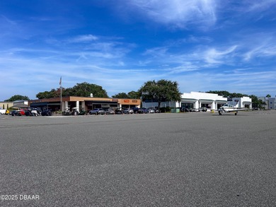 Experience the essence of refined Florida living in this on Spruce Creek Golf Club in Florida - for sale on GolfHomes.com, golf home, golf lot