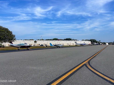 Experience the essence of refined Florida living in this on Spruce Creek Golf Club in Florida - for sale on GolfHomes.com, golf home, golf lot