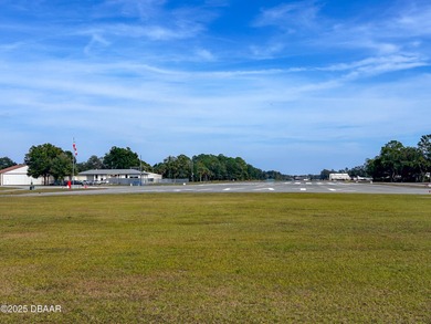 Experience the essence of refined Florida living in this on Spruce Creek Golf Club in Florida - for sale on GolfHomes.com, golf home, golf lot