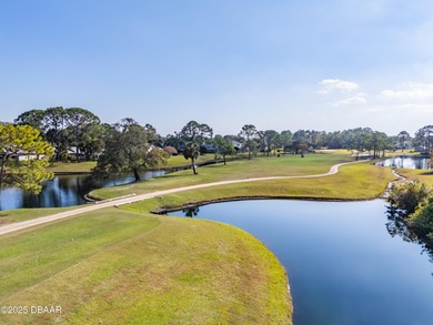 Experience the essence of refined Florida living in this on Spruce Creek Golf Club in Florida - for sale on GolfHomes.com, golf home, golf lot