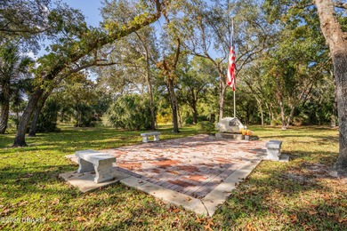 Experience the essence of refined Florida living in this on Spruce Creek Golf Club in Florida - for sale on GolfHomes.com, golf home, golf lot