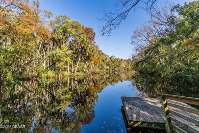 Experience the essence of refined Florida living in this on Spruce Creek Golf Club in Florida - for sale on GolfHomes.com, golf home, golf lot