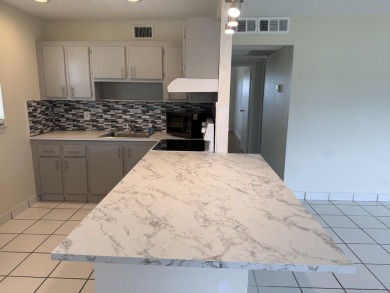Welcome to this beautiful freshly painted 2-bedroom, 2-bath on Kings Point Golf - Executive in Florida - for sale on GolfHomes.com, golf home, golf lot