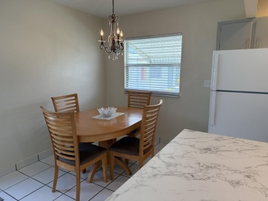Welcome to this beautiful freshly painted 2-bedroom, 2-bath on Kings Point Golf - Executive in Florida - for sale on GolfHomes.com, golf home, golf lot