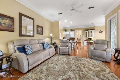 Overlooking the 11th hole, this Earl Whitehurst-built home on Hidden Hills Country Club in Florida - for sale on GolfHomes.com, golf home, golf lot