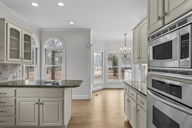 LAKE VIEWS AND A PREMIER GREAT WATERS LOCATION PRESENT AN on Great Waters Course At Reynolds Plantation in Georgia - for sale on GolfHomes.com, golf home, golf lot