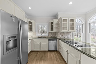 LAKE VIEWS AND A PREMIER GREAT WATERS LOCATION PRESENT AN on Great Waters Course At Reynolds Plantation in Georgia - for sale on GolfHomes.com, golf home, golf lot