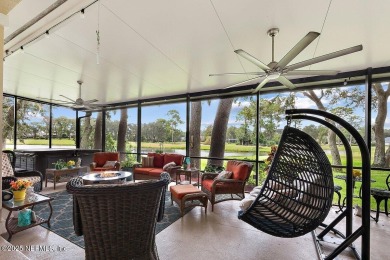 Overlooking the 11th hole, this Earl Whitehurst-built home on Hidden Hills Country Club in Florida - for sale on GolfHomes.com, golf home, golf lot