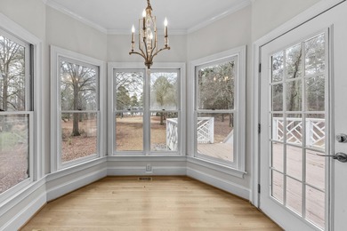 LAKE VIEWS AND A PREMIER GREAT WATERS LOCATION PRESENT AN on Great Waters Course At Reynolds Plantation in Georgia - for sale on GolfHomes.com, golf home, golf lot