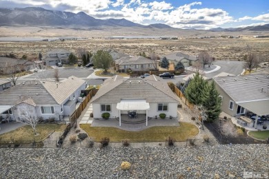 This home is perfectly located at the 13th hole with stunning on Dayton Valley Golf Club At Legado in Nevada - for sale on GolfHomes.com, golf home, golf lot