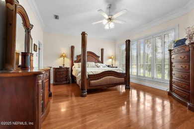 Overlooking the 11th hole, this Earl Whitehurst-built home on Hidden Hills Country Club in Florida - for sale on GolfHomes.com, golf home, golf lot