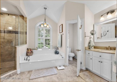 Overlooking the 11th hole, this Earl Whitehurst-built home on Hidden Hills Country Club in Florida - for sale on GolfHomes.com, golf home, golf lot