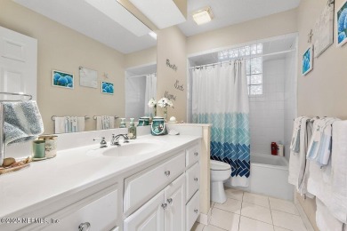 Overlooking the 11th hole, this Earl Whitehurst-built home on Hidden Hills Country Club in Florida - for sale on GolfHomes.com, golf home, golf lot