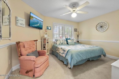 Overlooking the 11th hole, this Earl Whitehurst-built home on Hidden Hills Country Club in Florida - for sale on GolfHomes.com, golf home, golf lot