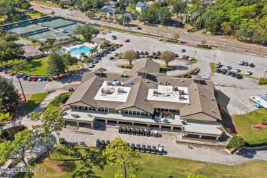 Overlooking the 11th hole, this Earl Whitehurst-built home on Hidden Hills Country Club in Florida - for sale on GolfHomes.com, golf home, golf lot