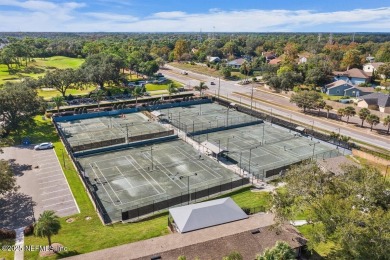Overlooking the 11th hole, this Earl Whitehurst-built home on Hidden Hills Country Club in Florida - for sale on GolfHomes.com, golf home, golf lot